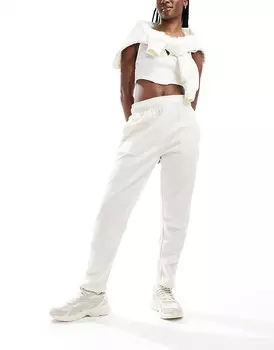 Белые спортивные брюки The North Face Evolution Cocoon
