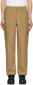 Бежевые брюки с нашивками Stone Island