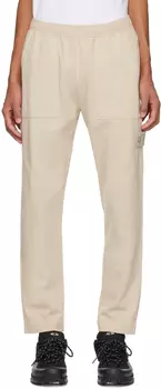 Бежевые домашние брюки с нашивками Stone Island