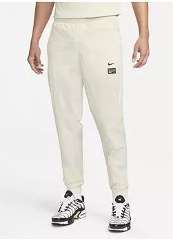 Бежевые мужские спортивные штаны Nike