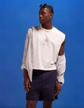 Бежевый укороченный жилет оверсайз с принтом в виде компаса на груди ASOS DESIGN