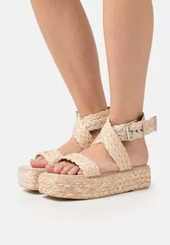 Босоножки на платформе RAID