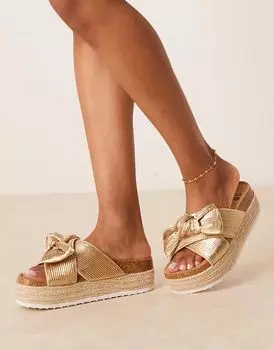 Босоножки на плоской платформе с бантом ASOS DESIGN золотистого цвета