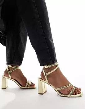 Босоножки на среднем каблуке с золотыми шипами ASOS Hampstead