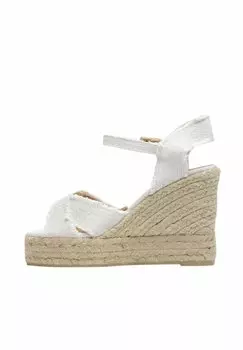 Босоножки на танкетке Castaer