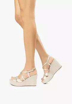 Босоножки на танкетке NeroGiardini, золотистый