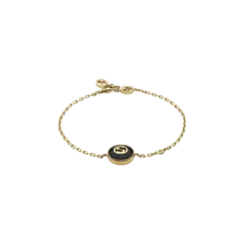 Браслет Gucci Interlocking из желтого золота и оникса