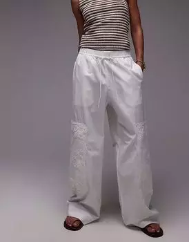 Брюки ARKET из чистого хлопка прямого кроя с вышивкой белого цвета