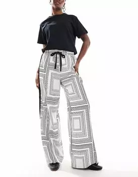 Брюки ASOS DESIGN с контрастной вставкой в геометрическом стиле с монохромным принтом