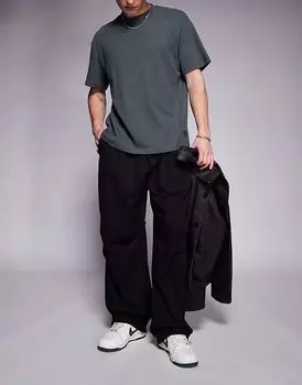 Брюки Bershka Parachute Baggy черного цвета