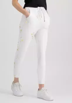 Брюки для бега Alpha Industries " Alpha Industries Women - Jogger AI Leg Jogger Foil AOP Wmn", цвет White/Yellow Gold