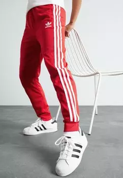 Брюки для бега TRACK PANTS UNISEX adidas Originals, цвет better scarlet