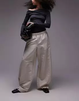 Брюки из атласа с резинкой на талии кремового цвета Mango