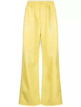 Брюки из искусственной кожи Nanushka, желтый