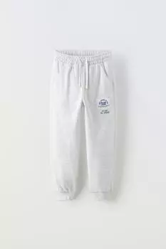 Брюки из плюша с аппликациями этикетки ZARA, серый мергель