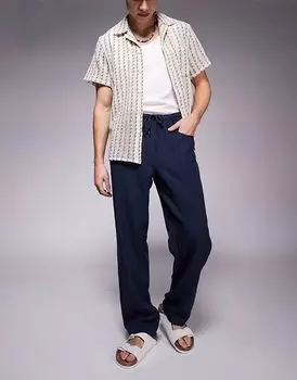Брюки-мешковатые с завязками на шнурке от ASOS DESIGN темно-синего цвета