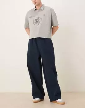 Брюки-парашюты свободного кроя с завязками на шнурке от ASOS DESIGN темно-синего цвета