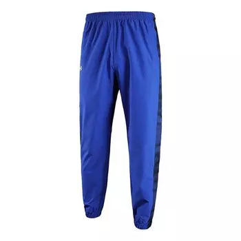 Брюки quick snap tearaway sweatpants 'blue' Under Armour, синий