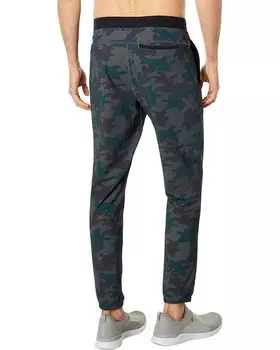 Брюки Rhone Versatility Pants, цвет Wild Forest Camo