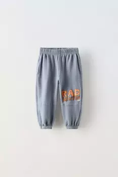 Брюки с лозунговым принтом ZARA, выцветший синий