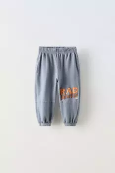 Брюки с лозунговым принтом ZARA, выцветший синий