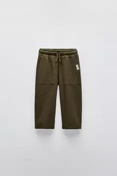 Брюки с текстурой и аппликациями-этикетками ZARA, хаки
