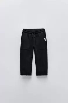 Брюки с текстурой и аппликациями-этикетками ZARA, черный