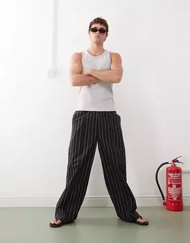 Брюки свободного кроя Weekday в черно-бежевую полоску