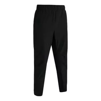 Брюки woven trousers 'black' Under Armour, черный