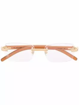 Cartier Eyewear очки в безободковой оправе, оранжевый