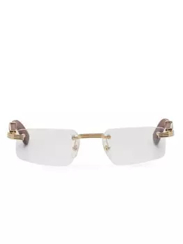 Cartier Eyewear очки в безободковой оправе, золотистый