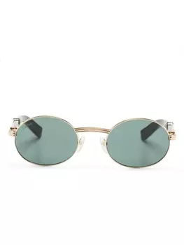 Cartier Eyewear солнцезащитные очки Premire de Cartier в овальной оправе, золотистый