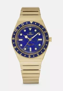 Часы Timex, золотого цвета