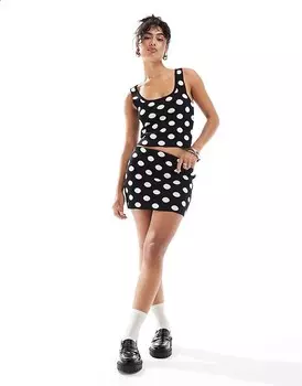 Черная трикотажная юбка в горошек Mango, однотонная