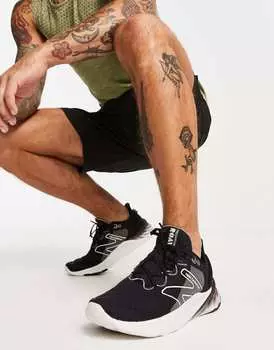 Черно-белые беговые кроссовки New Balance Roav