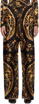 Черно-золотые брюки с рисунком Marine Serre