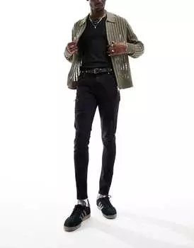 Черные эластичные джинсы с рваными краями ASOS DESIGN