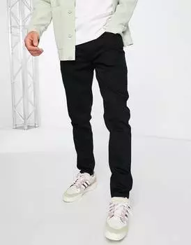 Черные эластичные зауженные джинсы ASOS DESIGN