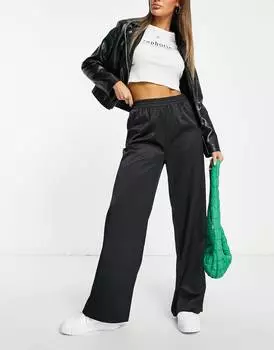 Черные атласные брюки без застежек ASOS DESIGN