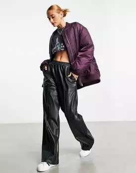 Черные брюки без застежек из искусственной кожи ASOS DESIGN