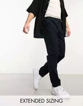 Черные брюки без застежки с эластичной резинкой на талии ASOS DESIGN