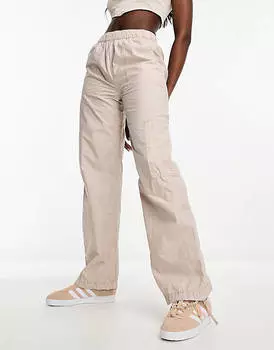 Черные брюки карго с застежкой на пуговицы ASOS DESIGN