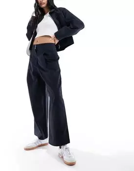 Черные брюки с изогнутыми штанинами ASOS