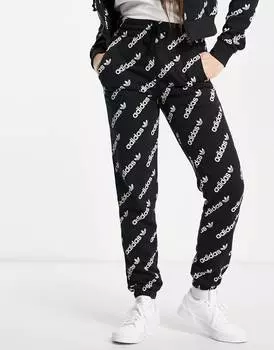 Черные джоггеры с повторяющимся логотипом adidas Originals 'Logomania'