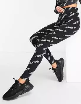 Черные леггинсы с повторяющимся логотипом adidas Originals 'Logomania'