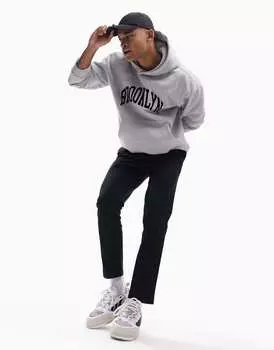 Черные плиссированные зауженные брюки чинос ASOS DESIGN