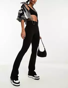 Черные расклешенные брюки из формирующего джерси Stradivarius