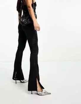 Черные расклешенные брюки с сетчатой вставкой Kaiia