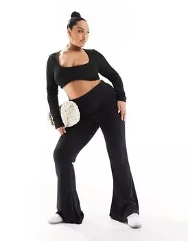 Черные расклешенные брюки в рубчик с рюшами по низу ASOS DESIGN Curve