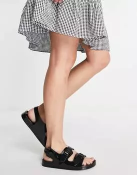 Черные сандалии на плоской подошве с пряжками ASOS DESIGN Fate